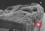 Image of scrap metal processing for war production United States USA, 1943, second 60 stock footage video 65675079289