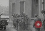 Image of captured German troops frisked Cherbourg Normandy France, 1944, second 3 stock footage video 65675079292