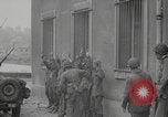 Image of captured German troops frisked Cherbourg Normandy France, 1944, second 4 stock footage video 65675079292