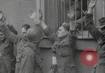 Image of captured German troops frisked Cherbourg Normandy France, 1944, second 9 stock footage video 65675079292