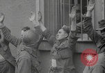 Image of captured German troops frisked Cherbourg Normandy France, 1944, second 11 stock footage video 65675079292