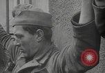 Image of captured German troops frisked Cherbourg Normandy France, 1944, second 15 stock footage video 65675079292