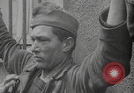 Image of captured German troops frisked Cherbourg Normandy France, 1944, second 18 stock footage video 65675079292