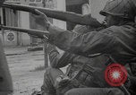 Image of captured German troops frisked Cherbourg Normandy France, 1944, second 25 stock footage video 65675079292