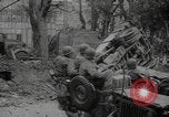 Image of captured German troops frisked Cherbourg Normandy France, 1944, second 32 stock footage video 65675079292
