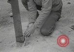 Image of Spiked gun road obstacle demolition Cherbourg Normandy France, 1944, second 6 stock footage video 65675079297