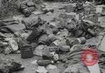 Image of German soldiers dead and scattered equipment Cherbourg Normandy France, 1944, second 4 stock footage video 65675079298
