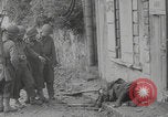 Image of German soldiers dead and scattered equipment Cherbourg Normandy France, 1944, second 14 stock footage video 65675079298