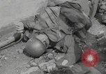 Image of German soldiers dead and scattered equipment Cherbourg Normandy France, 1944, second 15 stock footage video 65675079298