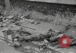 Image of German soldiers dead and scattered equipment Cherbourg Normandy France, 1944, second 18 stock footage video 65675079298