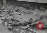 Image of German soldiers dead and scattered equipment Cherbourg Normandy France, 1944, second 19 stock footage video 65675079298