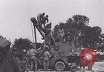 Image of French 501st Armored Regiment repairs Jeep WW2 United Kingdom, 1944, second 9 stock footage video 65675079314