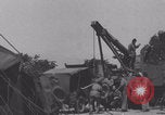 Image of French 501st Armored Regiment repairs Jeep WW2 United Kingdom, 1944, second 14 stock footage video 65675079314