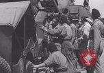 Image of French 501st Armored Regiment repairs Jeep WW2 United Kingdom, 1944, second 30 stock footage video 65675079314