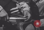 Image of French 501st Armored Regiment repairs Jeep WW2 United Kingdom, 1944, second 45 stock footage video 65675079314