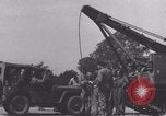 Image of French 501st Armored Regiment repairs Jeep WW2 United Kingdom, 1944, second 49 stock footage video 65675079314