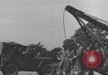 Image of French 501st Armored Regiment repairs Jeep WW2 United Kingdom, 1944, second 52 stock footage video 65675079314