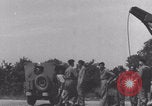 Image of French 501st Armored Regiment repairs Jeep WW2 United Kingdom, 1944, second 62 stock footage video 65675079314