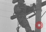 Image of African American linemen stringing wires Italy WW2 Italy, 1944, second 42 stock footage video 65675079319