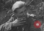 Image of German prisoners frisked WW2 Saint Lo France, 1944, second 55 stock footage video 65675079324