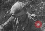 Image of German prisoners frisked WW2 Saint Lo France, 1944, second 56 stock footage video 65675079324