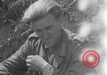 Image of German prisoners frisked WW2 Saint Lo France, 1944, second 62 stock footage video 65675079324