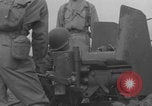 Image of 57 MM gun M1 United Kingdom, 1944, second 27 stock footage video 65675079334