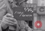 Image of Free French 2nd Armored Division welcomed La Haye du Puits France WW2 La Haye Du Puits France, 1944, second 58 stock footage video 65675079341