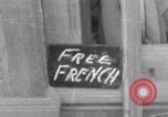Image of woman welcomes Free French troops with flowers La Haye Du Puits France, 1944, second 1 stock footage video 65675079343