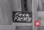 Image of woman welcomes Free French troops with flowers La Haye Du Puits France, 1944, second 3 stock footage video 65675079343