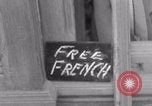 Image of woman welcomes Free French troops with flowers La Haye Du Puits France, 1944, second 4 stock footage video 65675079343
