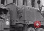Image of woman welcomes Free French troops with flowers La Haye Du Puits France, 1944, second 9 stock footage video 65675079343