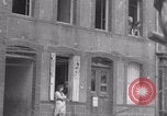 Image of woman welcomes Free French troops with flowers La Haye Du Puits France, 1944, second 13 stock footage video 65675079343