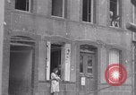 Image of woman welcomes Free French troops with flowers La Haye Du Puits France, 1944, second 15 stock footage video 65675079343
