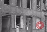 Image of woman welcomes Free French troops with flowers La Haye Du Puits France, 1944, second 16 stock footage video 65675079343