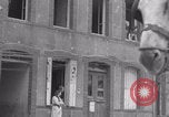 Image of woman welcomes Free French troops with flowers La Haye Du Puits France, 1944, second 17 stock footage video 65675079343