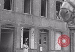 Image of woman welcomes Free French troops with flowers La Haye Du Puits France, 1944, second 18 stock footage video 65675079343