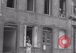 Image of woman welcomes Free French troops with flowers La Haye Du Puits France, 1944, second 19 stock footage video 65675079343
