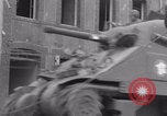 Image of woman welcomes Free French troops with flowers La Haye Du Puits France, 1944, second 20 stock footage video 65675079343