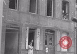 Image of woman welcomes Free French troops with flowers La Haye Du Puits France, 1944, second 23 stock footage video 65675079343
