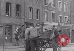 Image of woman welcomes Free French troops with flowers La Haye Du Puits France, 1944, second 30 stock footage video 65675079343
