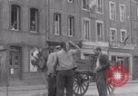 Image of woman welcomes Free French troops with flowers La Haye Du Puits France, 1944, second 32 stock footage video 65675079343