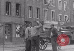 Image of woman welcomes Free French troops with flowers La Haye Du Puits France, 1944, second 33 stock footage video 65675079343