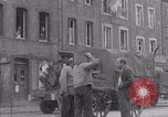 Image of woman welcomes Free French troops with flowers La Haye Du Puits France, 1944, second 34 stock footage video 65675079343
