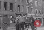 Image of woman welcomes Free French troops with flowers La Haye Du Puits France, 1944, second 36 stock footage video 65675079343