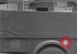 Image of woman welcomes Free French troops with flowers La Haye Du Puits France, 1944, second 40 stock footage video 65675079343