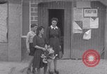 Image of woman welcomes Free French troops with flowers La Haye Du Puits France, 1944, second 41 stock footage video 65675079343