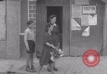 Image of woman welcomes Free French troops with flowers La Haye Du Puits France, 1944, second 42 stock footage video 65675079343