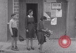 Image of woman welcomes Free French troops with flowers La Haye Du Puits France, 1944, second 43 stock footage video 65675079343
