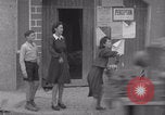 Image of woman welcomes Free French troops with flowers La Haye Du Puits France, 1944, second 45 stock footage video 65675079343